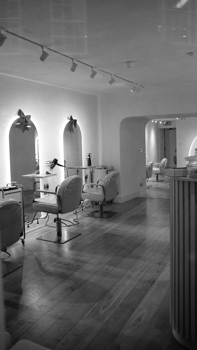 Styling chairs and mirrors in a modern hair salon