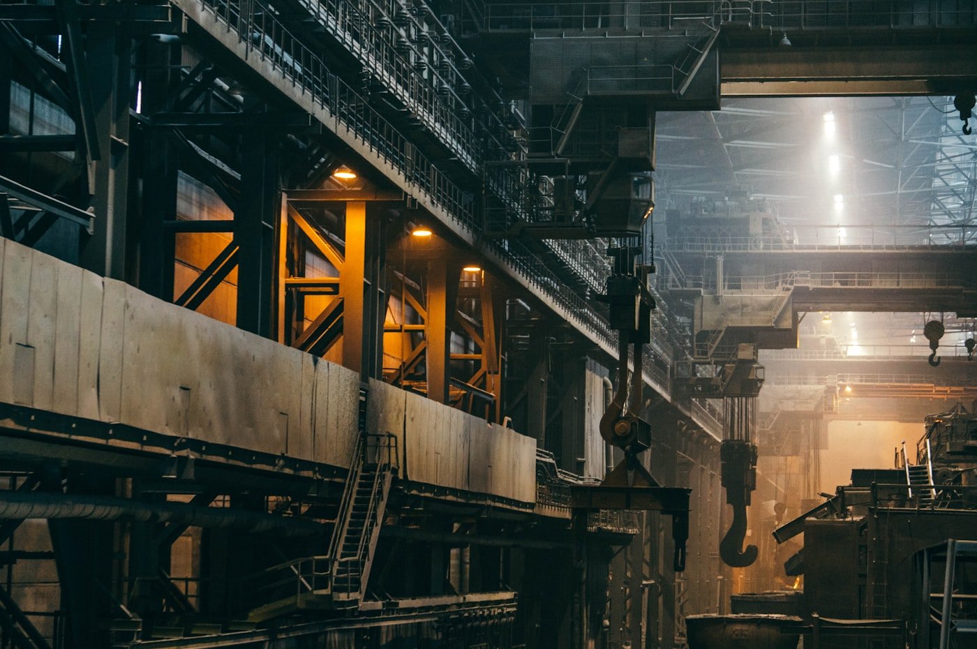 The floor of a heavy-industry factory with gantry cranes