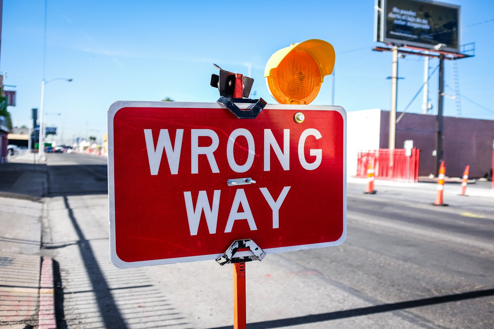 Red "Wrong Way" road sign — symbolizing the path to penalty recovery