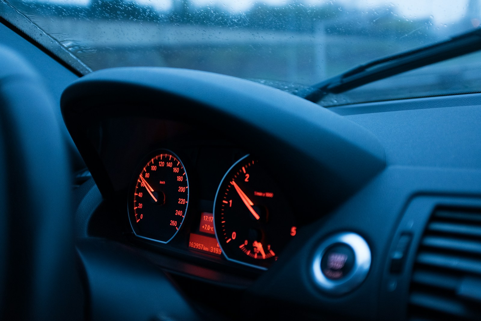 Close-up of a vehicle instrument cluster speedometer — illustrating speed and performance metrics